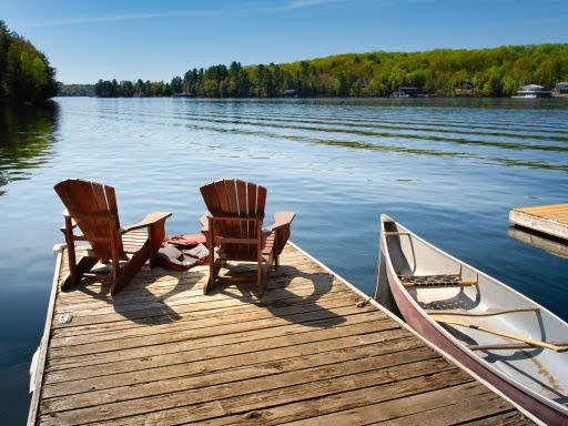 two chairs on a dock